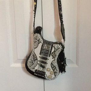 One of its kind Guitar shaped evening bag